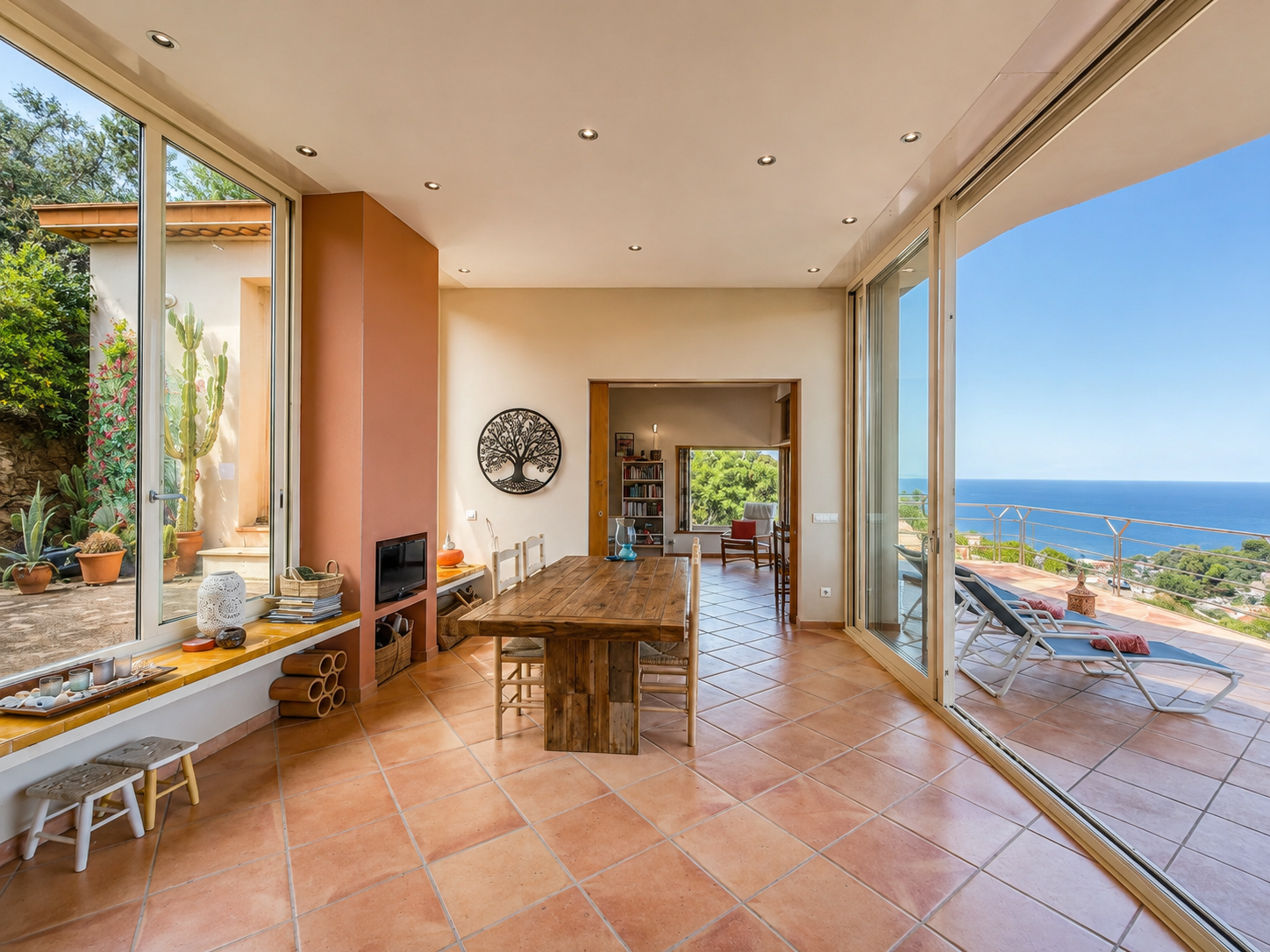 Dining room opening to sea-view terrace