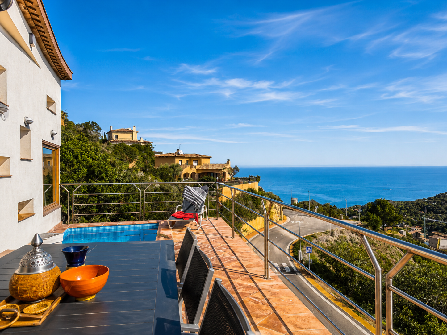 Terrace with pool and sea views