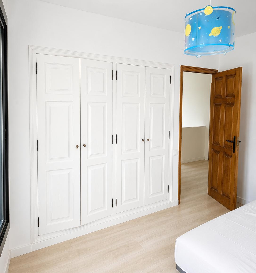 Bedroom with fitted wardrobes